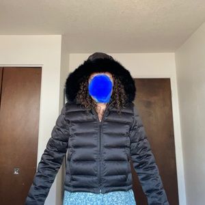 Down jacket with faux fur hood